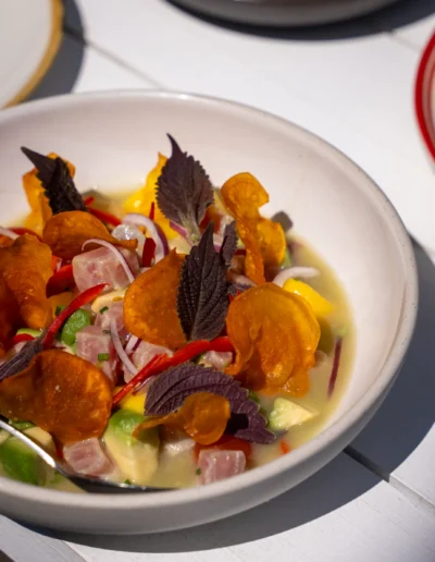 Ceviche de Atun / 28 tiger's milk, yellow fin tuna, cherry tomato, mango, avocado, coriander, sweet potato crisps