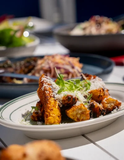 Costillas de Maiz Ahumado / 13.5 bbq corn ribs, jalapeño crema, salted ricotta